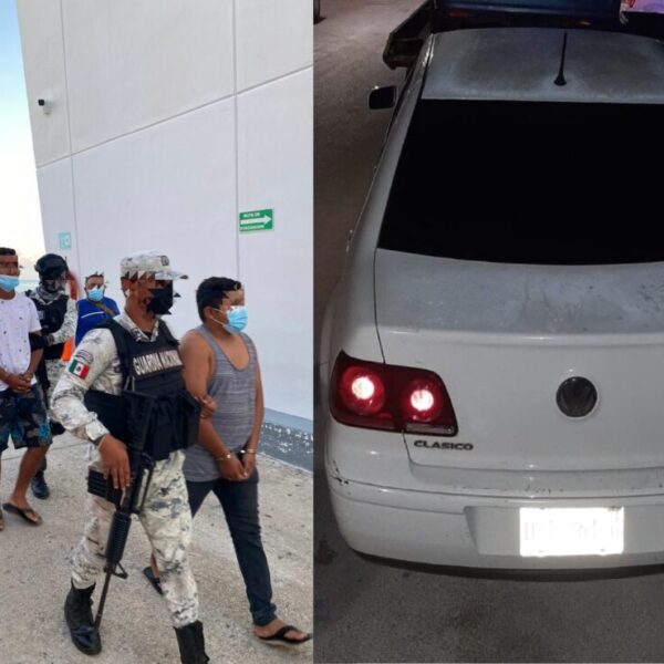 Dos detenidos en carro con reporte de robo y en posesión de drogas.