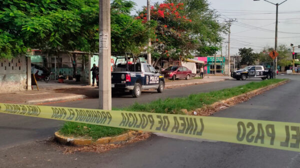 Cancun: Balean a dos personas en lavadero de autos en la SM 76