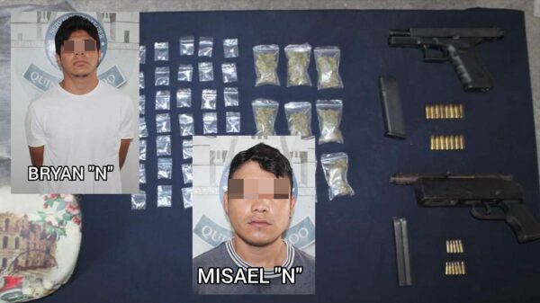 Detienen autoridades en Cancún a dos narcos empistolados