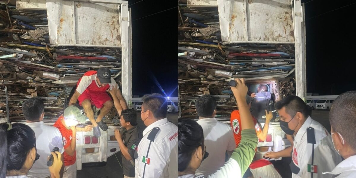 Aseguran a 45 inmigrantes escondidos entre chatarra; viajaban hacinados en compartimento oculto de un tractocamión.