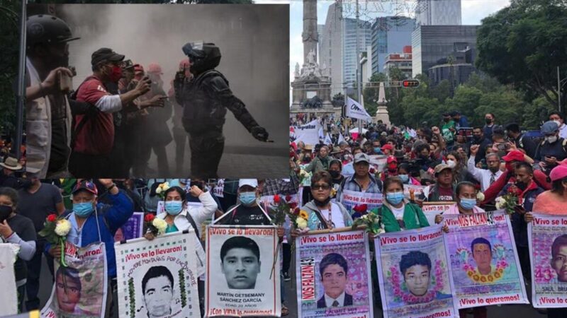 Chocan normalistas y policías en marcha por 8vo aniversario de desapariciones