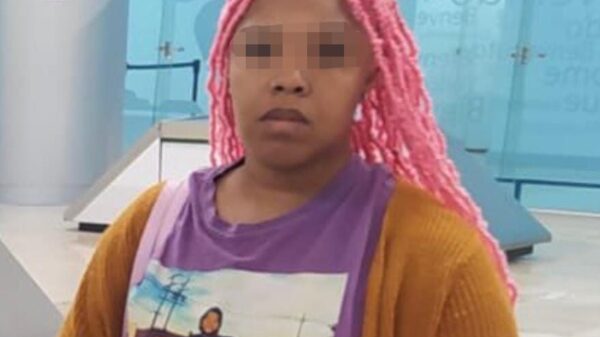 Procesan por portación de arma a estadounidense detenida en el aeropuerto de Cancún.