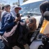 Protestan migrantes ante AMLO en Ciudad Juárez; exigen justicia