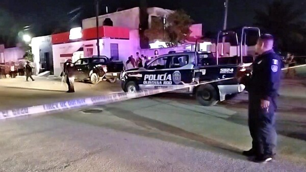Ejecutan a hombre en Cancún y hieren a otro
