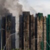 Sube a 65 cifra muertos por incendio en Hong Kong