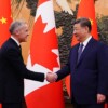 Canadá se distancia de EU, elimina con China aranceles