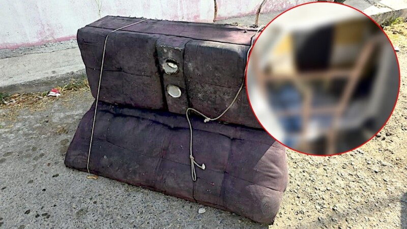 Abandonan ‘diablito’ con un cuerpo metido en un sillón