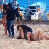 Riña de mujeres convierte playa de Puerto Juárez en arena de lucha libre