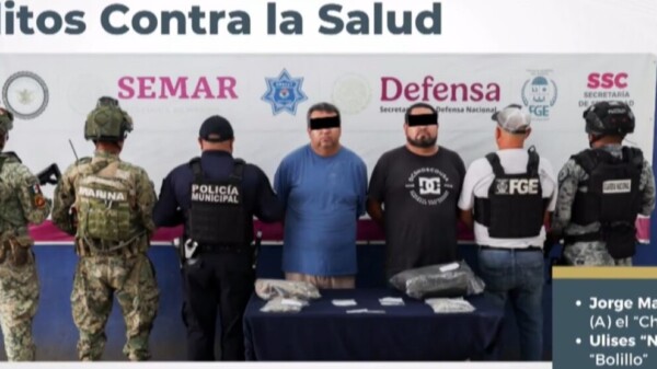 Capturan a dos hombres en Cancún por posible clonación de tarjetas