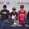 Detienen a dos hombres con presunto enervante y un arma corta en la Supermanzana 531 de Cancún