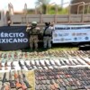 Fuerzas Armadas localizan arsenal oculto en tambos enterrados en Sinaloa