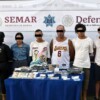Detienen a cinco cubanos con presuntas drogas y un arma en la SM 63 de Cancún