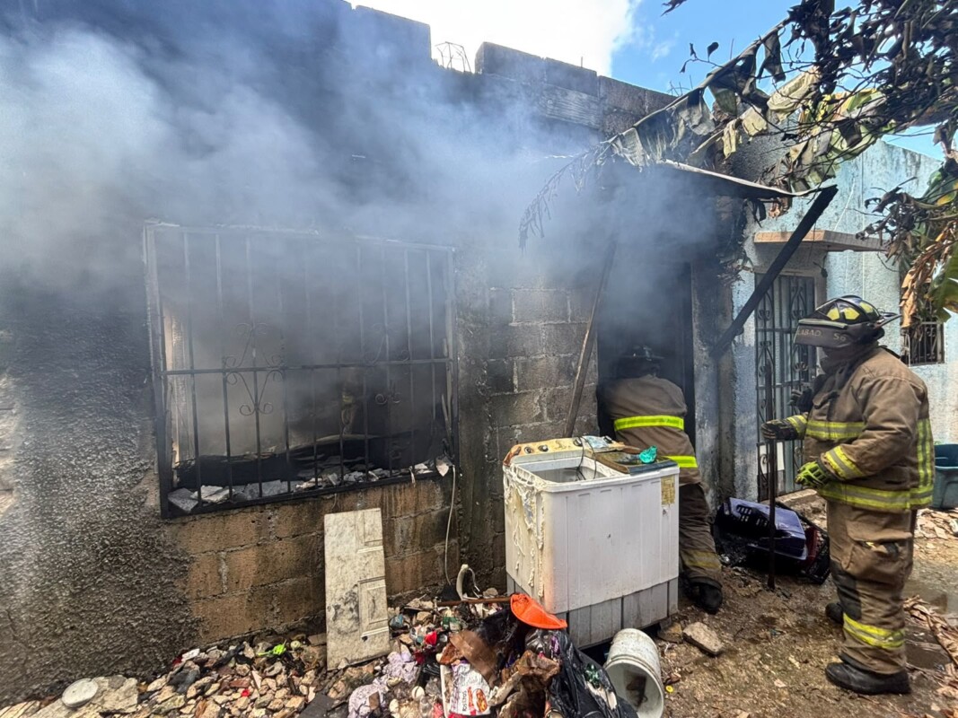 Veladora provoca incendio en una casa de la SM 228 de Cancún